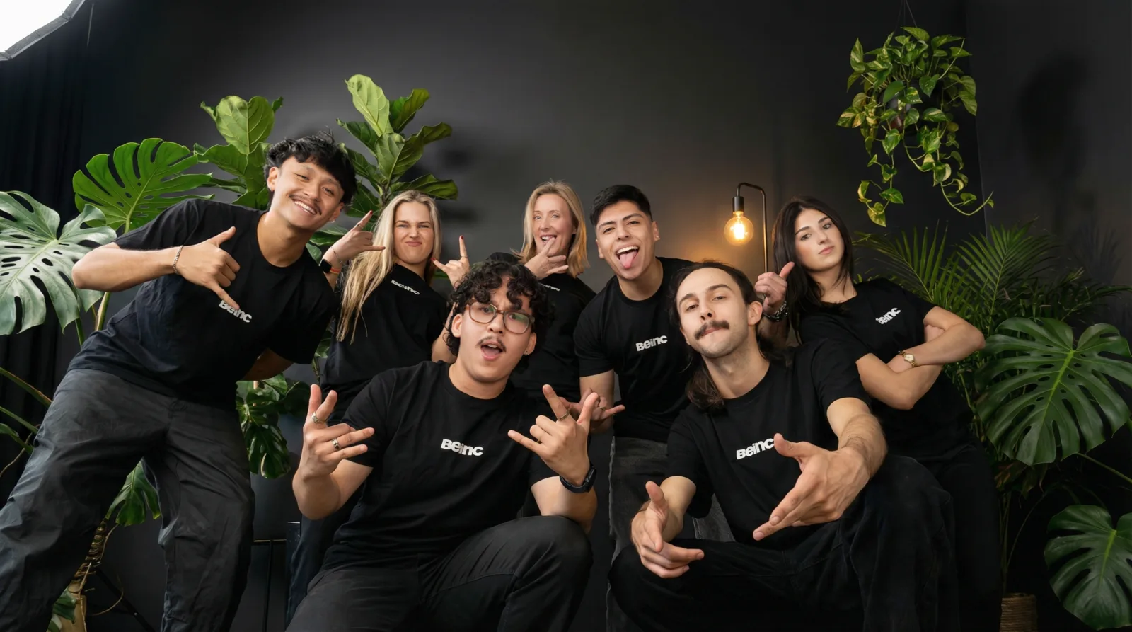 Beinc creative agency team photographed from above, gathered together in the studio