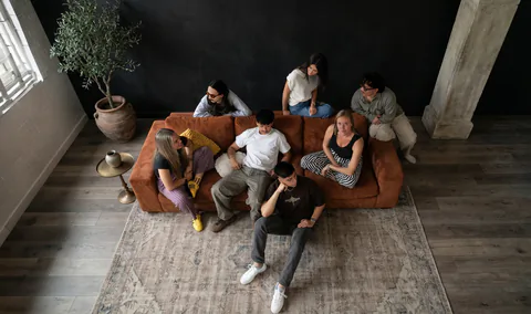 Beinc creative agency team relaxing on the studio couch